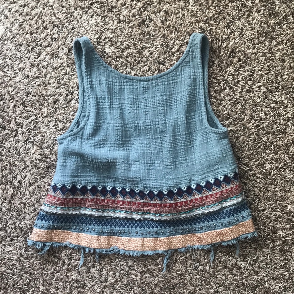 Free People turquoise tank top with open back